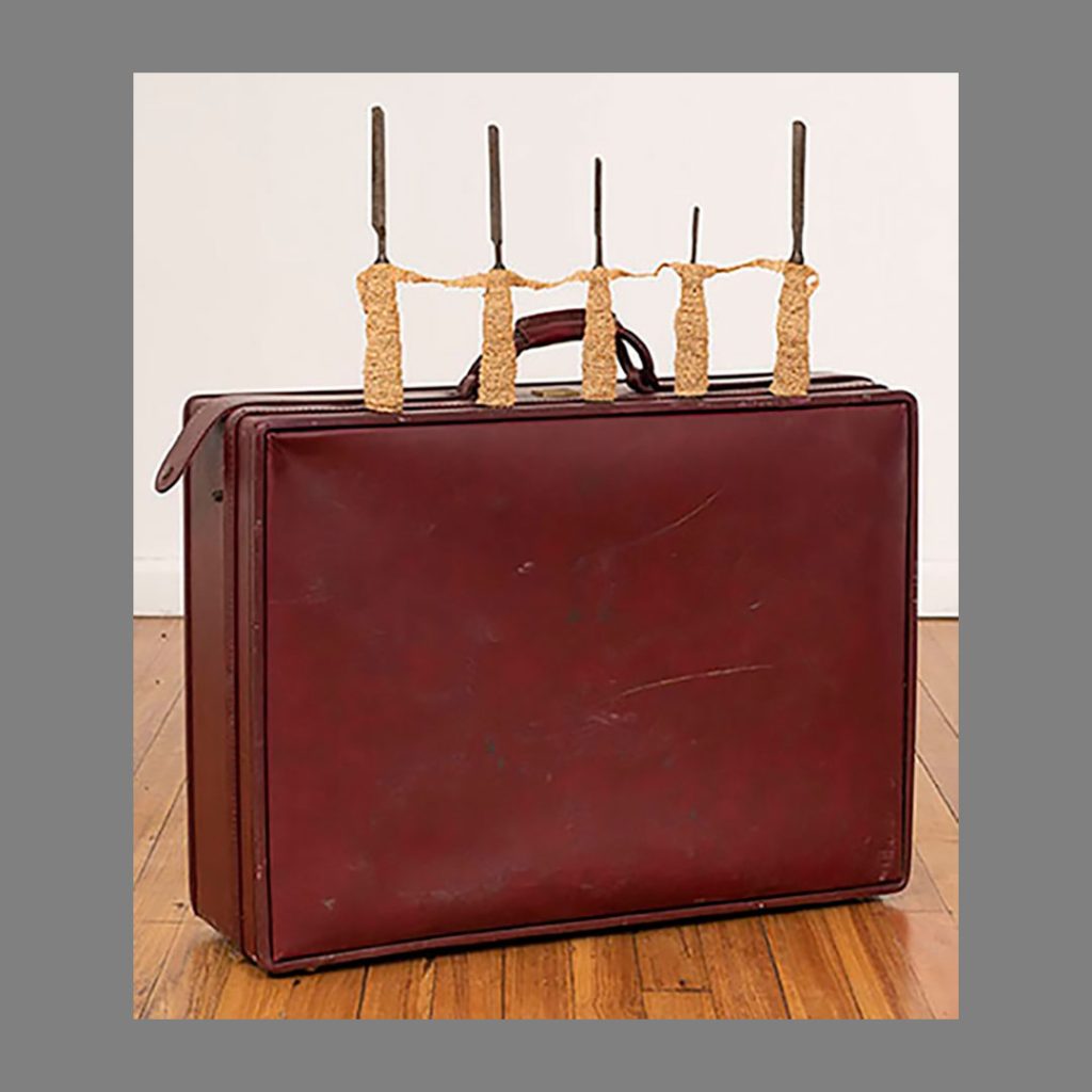 Suitcase, Raffia, Found Objects, 13” x 7.5”x 7.5