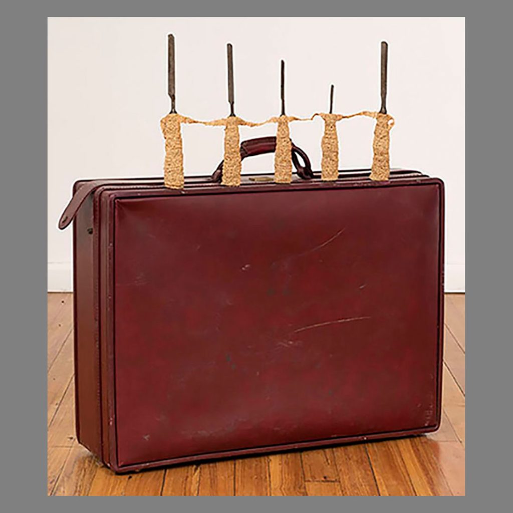 Suitcase, Raffia, Found Objects, 13” x 7.5”x 7.5